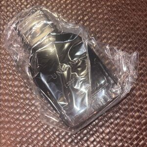 Tumi Unwind Black Bottle Brand New